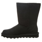A black, mid-calf BEARPAW Elle Short Vegan Boot for women with visible stitching and a flat textured sole, shown side profile on white. Features soft vegan micro suede and NeverWet® technology for added protection.
