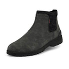 The Hey Dude Scott Grip Boots - Mens are weather-ready Chelsea boots in dark gray with black elastic side panels, subtle stitching, a textured ultra-grip outsole, water-resistant leather, and a rugged rounded-toe design.