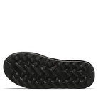 The image shows the black rubber sole of the BEARPAW Tamara Boots for women, featuring a rugged tread pattern for traction. The textured grip and rounded edges make these boots ideal for any adventurous outing.