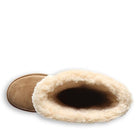 Top view of BEARPAW Kendall Boots - Womens, featuring a fluffy cream-colored shearling lining and soft interior, against a white background—evoking cozy days in Lake Tahoe.