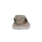 Front view of the Hey Dude Flinn Sandals - Mens, featuring a tan and beige flip-flop design with a white speckled sole, fabric strap, and visible stitching—lightweight for all-day comfort.