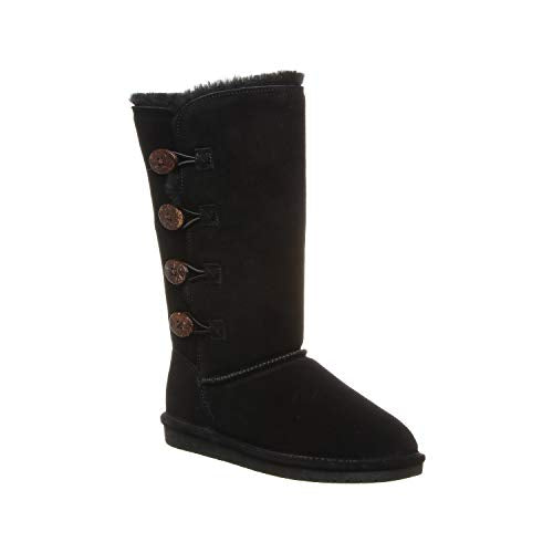 The BEARPAW Lori Boots for women feature black suede, a flat sole, soft sheepskin wool lining, and four decorative buttons along the outer side.