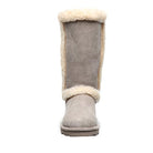 A single tan BEARPAW Kendall Boot for women with cream shearling trim, displayed from the front against a white background—ideal for cozy days by Lake Tahoe.