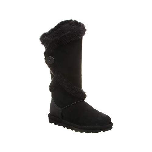 A single BEARPAW Sheilah womens boot in black, featuring a thick rubber sole, faux fur trim at the top and angled midsection, and a side decorative button, stands upright against a plain white background.