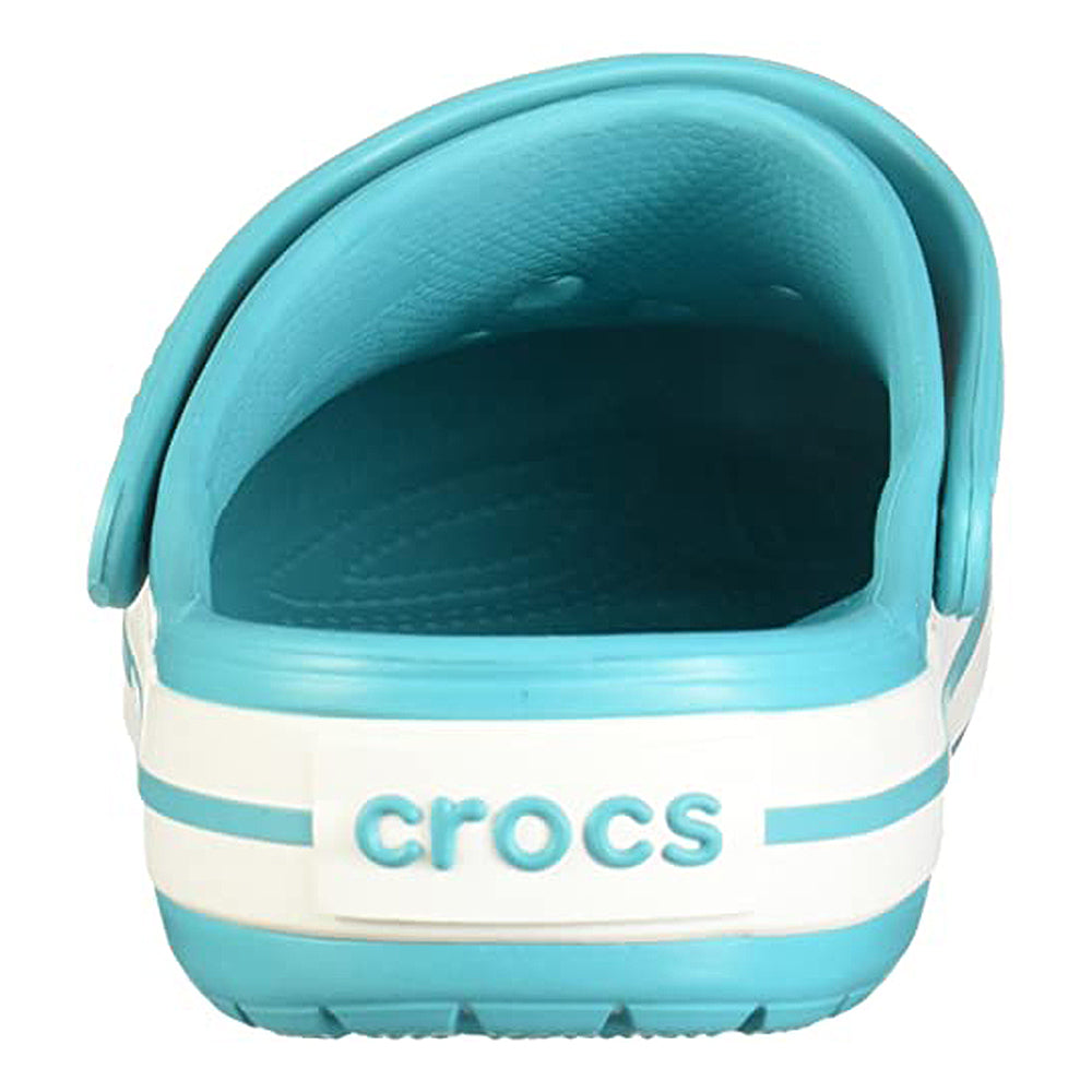 A close-up of the Crocs Crocband Clog Seasonal Colors - Unisex in light blue, featuring a white heel strap, crocs branding above a white and blue striped sole. Sporty, stylish unisex clogs for sale.