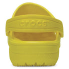 The Crocs Classic Clog - Kids in bright yellow, shown from the back with an embossed Crocs logo on the heel strap—perfect for kids everyday comfort.