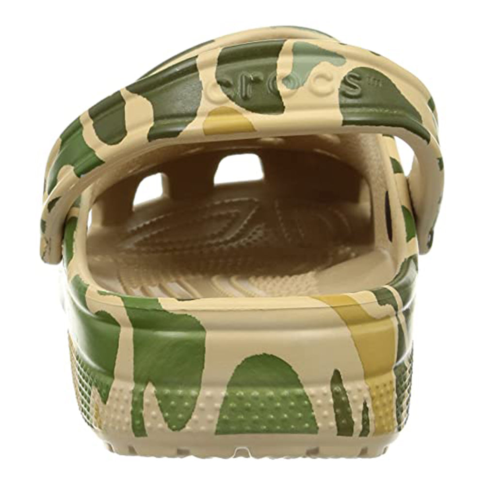A close-up rear view of the Crocs Classic Camo Clog - Unisex, a comfortable slip-on water shoe with a swiveling heel strap and textured footbed, shown in tan, green, and brown.