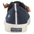 The Sperry Crest Vibe - Womens sneaker, shown in navy blue from the back, features a white vertical stripe, brown leather laces, a white sole with Sperry branding and Since 1935 on the heel, plus all-day comfort with arch support.