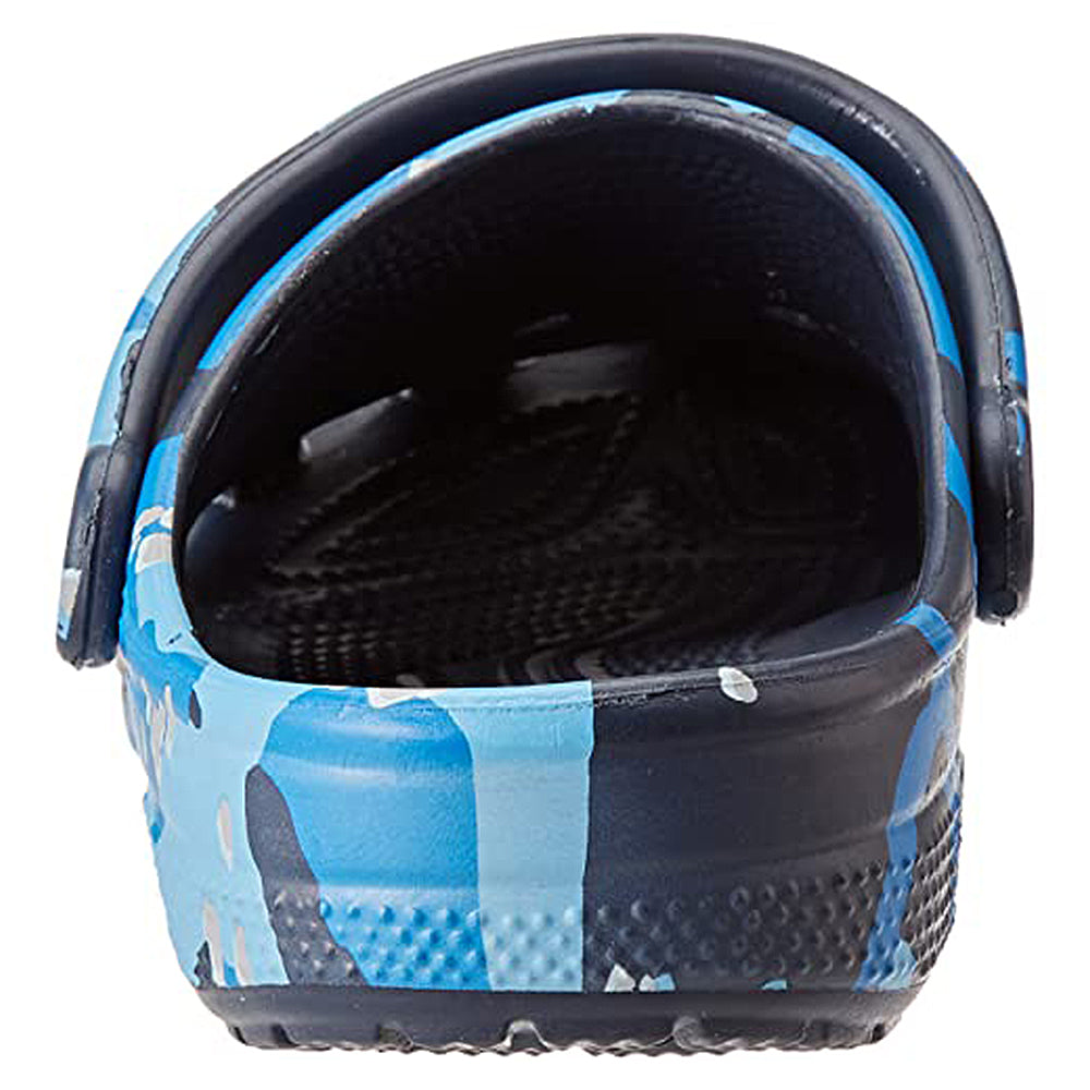 A rear close-up of the Crocs Classic Camo Clog - Unisex, featuring a blue and black camo pattern, back strap, and textured black insole—ideal slip-on shoes for comfortable water activities.