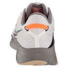 A rear view of the Saucony Guide 16 Running Shoe - Mens shows an orange pull tab, light gray upper, thick dark gray sole, textured heel patterns, and subtle ventilation holes for a cushioned ride.
