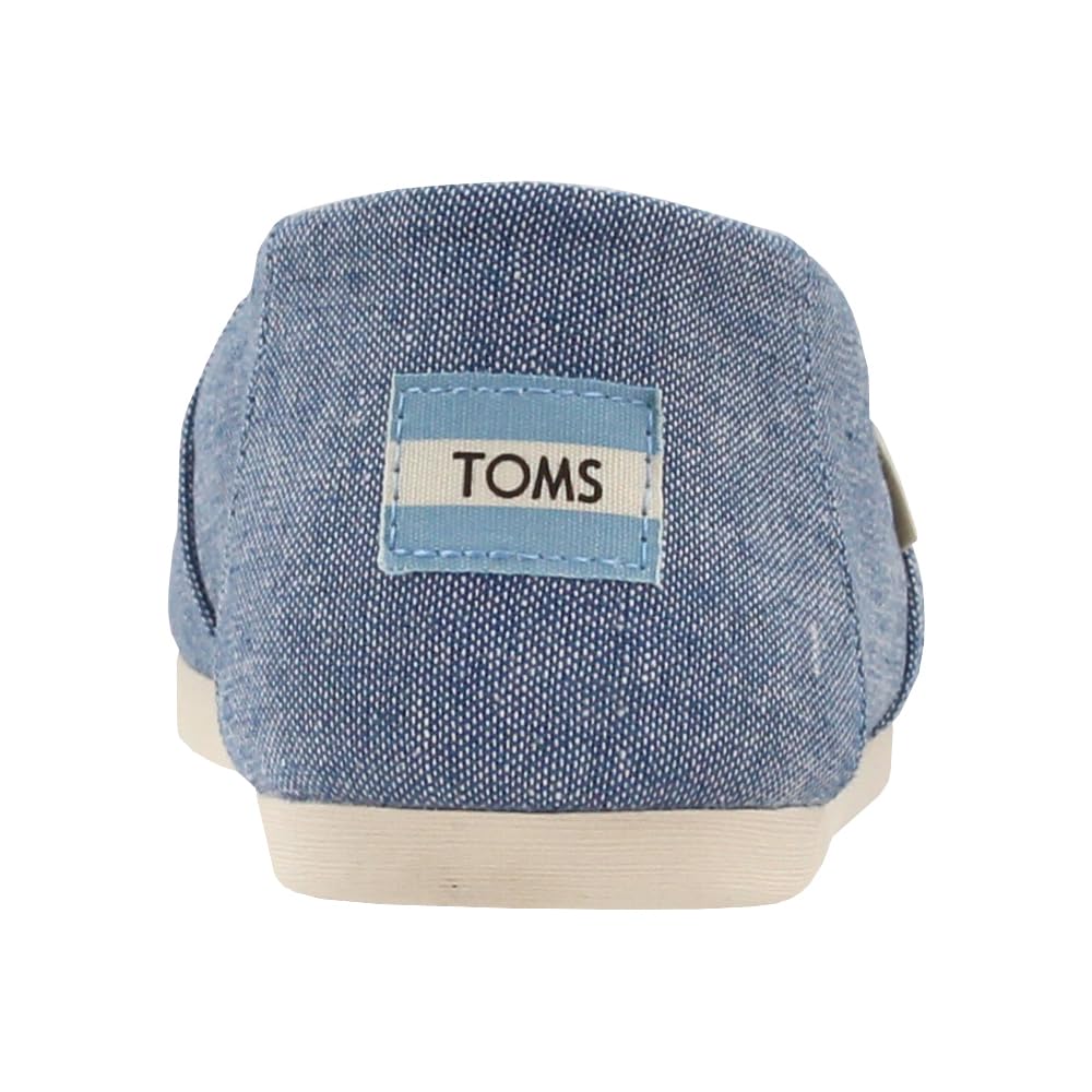 Back view of the TOMS Alpargata ESP - Women in light blue fabric, featuring a white sole, stitched TOMS heel label, classic slip-on design, and representing the brand’s buy one give one philosophy.