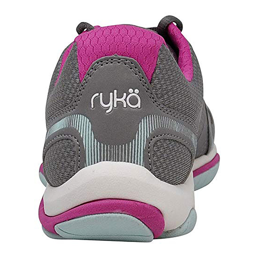 A close-up rear view of the Ryka Influence - Women’s workout shoe in gray and pink with a white logo on the heel, teal and white accents on the sole—perfect as a lightweight cross-trainer.