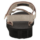 A close-up rear view of the Teva Midform Universal - Womens sandal in beige and black, showing a textured black sole and adjustable water-ready straps with hook-and-loop fasteners.