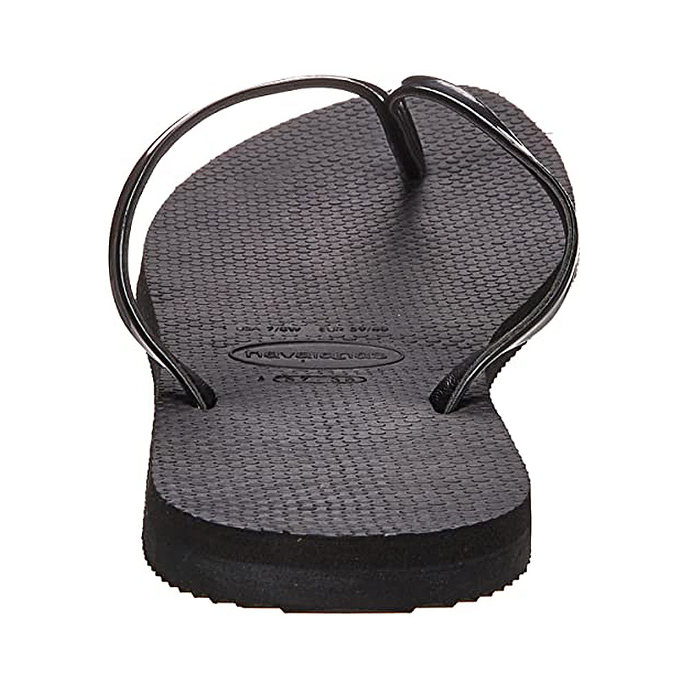 A close-up of a single black Havaianas Slim Metalic - Womens sandal, shown from the back with thin straps and a textured rubber sole, on a white background.
