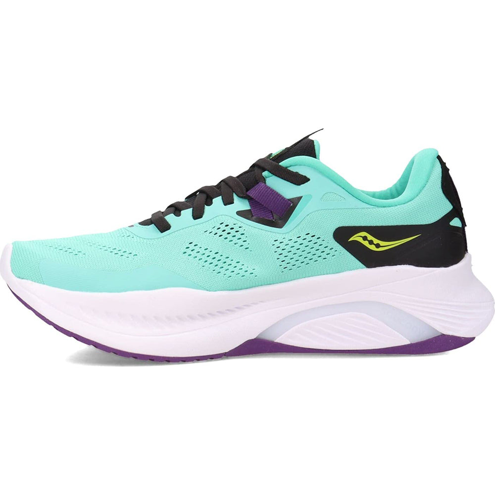 The Saucony Guide 15 - Womens is a turquoise running shoe with black laces, a white and purple sole, yellow side logo, and cushioned support for comfort on every run.