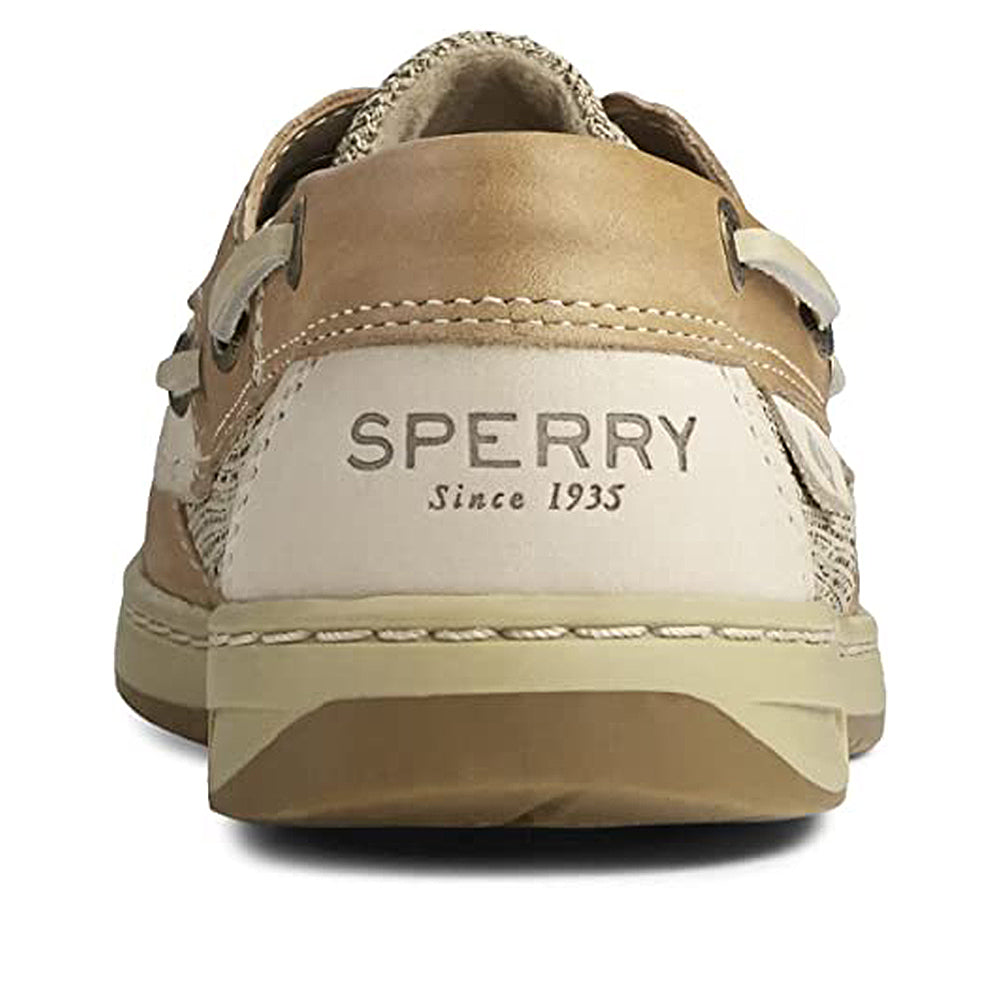Rear view of the Sperry Bluefish - Women boat shoe in tan and beige, highlighting the heel with SPERRY Since 1935 branding. The leather upper has contrast stitching and classic leather lace accents.