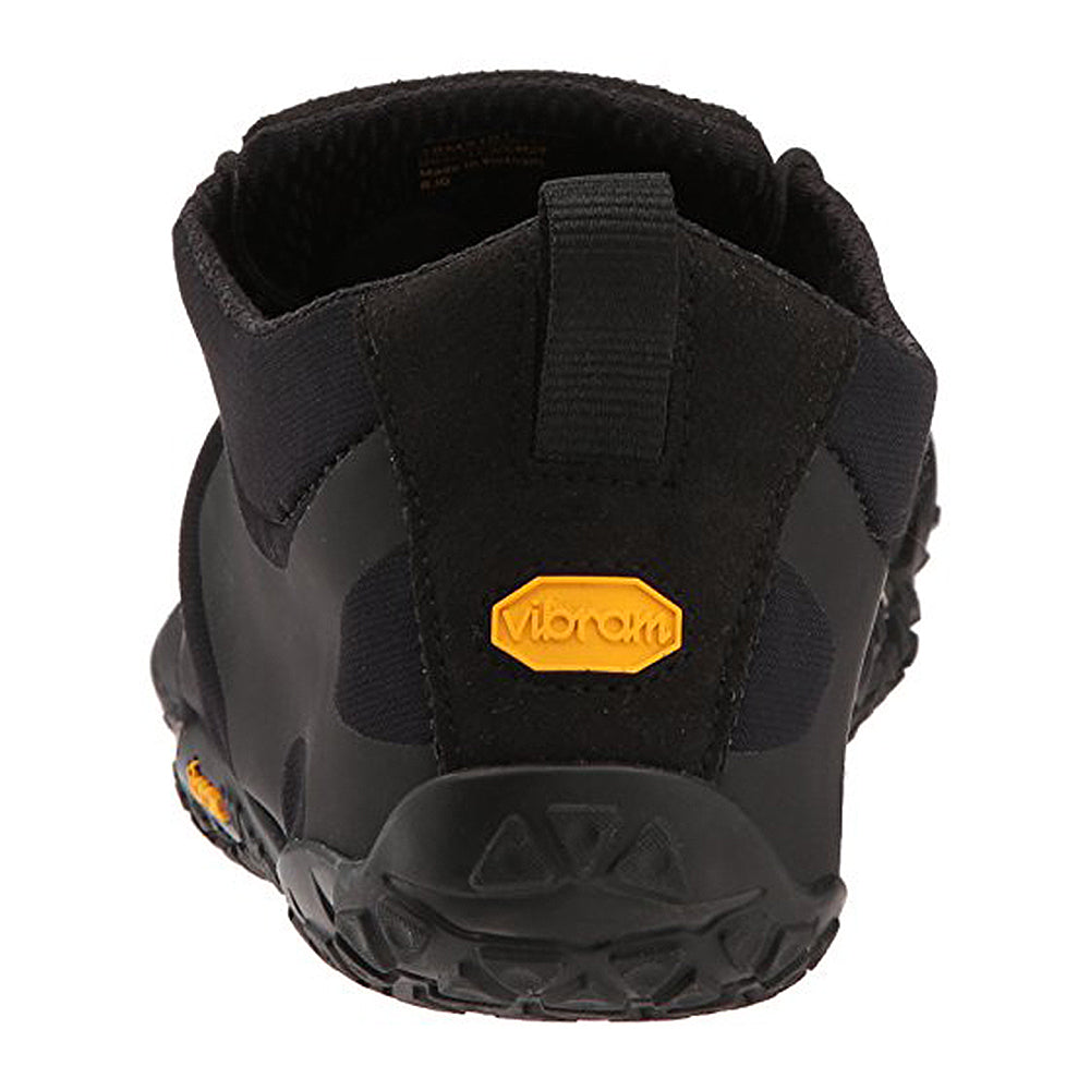 Rear view of the Vibram FiveFingers Five Fingers V-Alpha - Men in black, featuring a yellow Vibram logo on the heel and a textured rubber outsole, designed for foot protection, shown against a white background.
