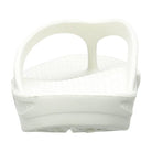 A close-up rear view of Telic Footwears Energy Flip Flop - Unisex in white, featuring a thick sole, two wide straps, pillow-soft cushioning, and arch support—a blend between flip flop and slide.