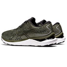 A pair of olive green ASICS Gel Cumulus 24 - Mens running shoes with black accents and white soles, shown side by side facing left—ideal as an everyday trainer with responsive cushioning.