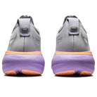ASICS Gel Nimbus 25 - Womens shoes shown from the back, featuring light gray uppers, thick soles with an orange-purple gradient, lightweight cushioning, and a heel loop for easy on/off.