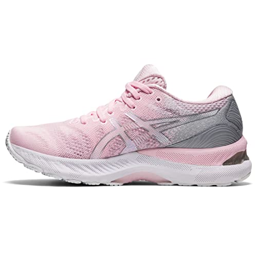 The ASICS Gel Nimbus 23 - Womens is shown in a side profile view, featuring light pink with white and silver accents, a white sole, gray heel area, and advanced shock absorption technology.