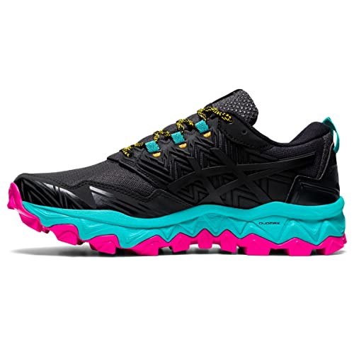 The ASICS GEL-FujiTrabuco 8 – Women’s is a black trail running shoe featuring a chunky turquoise midsole, bright pink rugged outsole, yellow-accented laces, geometric patterns, and a breathable mesh upper.
