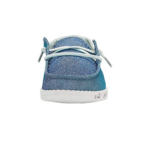 Front view of a blue glittery Hey Dude Wendy Youth - Girls shoe with white laces and a white sole, set against a plain white background. Lightweight and stylish, these shoes offer comfort for everyday wear.