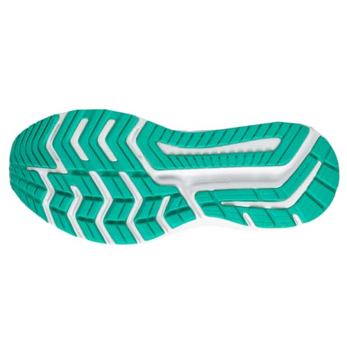 The image shows the teal and white rubber outsole of the Saucony Omni 20 Running Shoe - Womens, featuring chevron-shaped grooves and textured patterns for traction, flexibility, and stability.