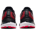 Rear view of black and red ASICS Gel Kayano 28 - Mens stability running shoes with white and red soles, featuring heel cushioning, GEL technology, and textured patterns on the back.