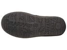 The sole of the BEARPAW Lori Boots - Womens features the brand name, a bear paw print, and an embossed leaf pattern on its water resistant surface.