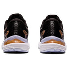 Two black ASICS Cumulus 23 - Womens running shoes viewed from the back, with orange and white accents, white soles, brown heel detail, and lightweight cushioning for comfort.