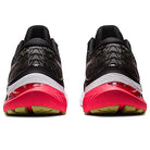 Rear view of ASICS Gel Kayano 29 - Mens running shoes in black with white midsoles, bright red heels, and yellow outsole accents on a white background—engineered for outstanding stability with every step.