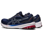 A pair of ASICS GT-1000 11 - Mens running shoes in navy with white and red accents, mesh uppers, FLYTEFOAM cushioning, and ASICS logo on the side, positioned side by side at an angle.