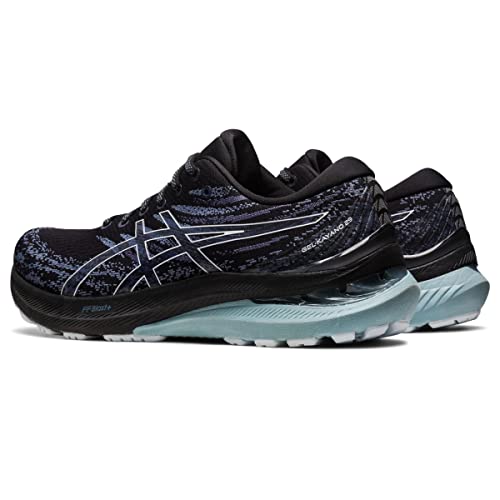 The ASICS Gel Kayano 29 - Mens running shoes feature a black and blue wave pattern, white accents, and a thick light blue sole. Known for stability, they are displayed with one shoe slightly ahead of the other.