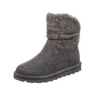 The BEARPAW Virginia Boots - Womens is a single gray sheepskin boot with a wool knit shaft, soft fuzzy lining, and flat ridged sole for traction.