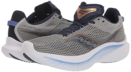 The Saucony Kinvara 14 Running Shoe - Womens features gray mesh uppers, navy and gold details, white midsoles, blue heel/sole accents, and a modern, breathable design with responsive PWRRUN foam cushioning.