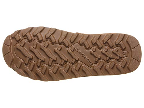 Close-up of the brown rubber sole of the BEARPAW Virginia Boots - Womens, showing a rugged, textured tread for traction and durability. The BEARPAW logo is visible in the center.