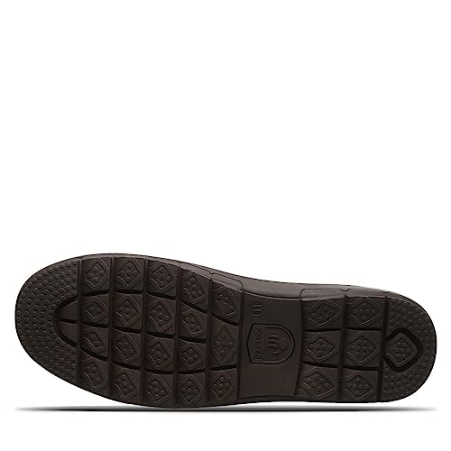 The image shows the bottom of the BEARPAW Harry Slippers - Mens sole, featuring square and circular tread patterns and a small logo at the arch—ideal for anyone wanting cozy mens slippers.