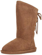 The BEARPAW Phylly Boots for women feature a tan suede knee-high design with a flat sole, soft suede upper, and a decorative back bow—ideal winter boots.