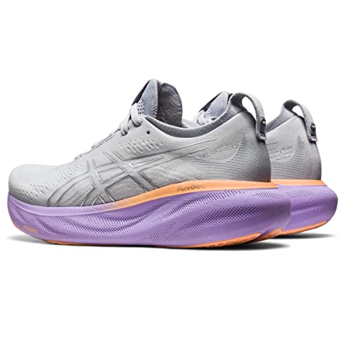 A pair of ASICS Gel Nimbus 25 - Womens shoes in light gray with thick, gradient orange and purple soles is shown from a rear-side angle. These running shoes provide lightweight cushioning against a white background.