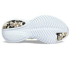 The image features the white, wavy sole of the Saucony Kinvara 14 Running Shoe - Womens, with beige, black, and tan camo-patterned rubber at the heel and toe for grip—designed to pair with its responsive PWRRUN foam cushioning.