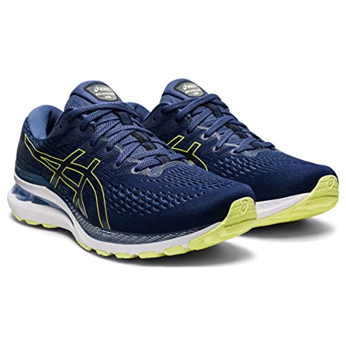 A pair of ASICS Gel Kayano 28 - Men’s stability running shoes in navy blue with lime green accents and white midsoles, featuring advanced GEL technology, displayed on a white background.