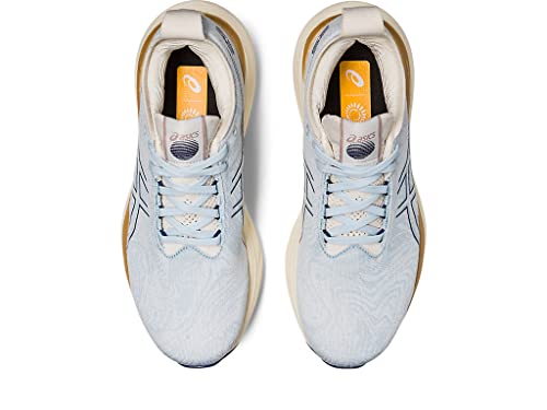 A top view of the ASICS Gel Nimbus 25 - Womens shoes in light blue, with white laces, patterned uppers, beige soles, and lightweight cushioning for comfort.