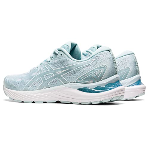 A pair of light blue ASICS Cumulus 23 - Womens running shoes with white soles and subtle ASICS side logos, featuring lightweight cushioning, displayed on a plain white background.