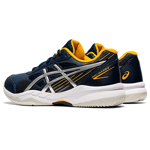 A pair of kids’ ASICS Gel-Game 8 tennis shoes in navy blue and yellow, featuring cushioned white soles, metallic silver stripes, and ASICS branding on the side and heel. Both the side and back views are visible.