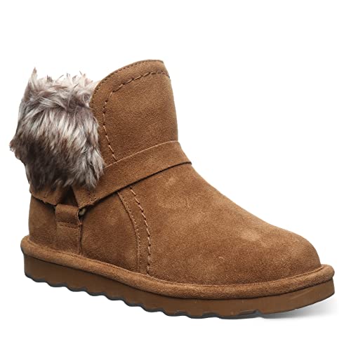 The BEARPAW Konnie Boots - Womens are brown suede boots with a flat sole, faux fur trim at the ankle, visible stitching, and a side strap detail.