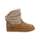 The BEARPAW Virginia Boots for women feature a tan suede exterior, textured wool knit shaft, light brown rubber sole, and a soft white fleece lining for enhanced comfort.