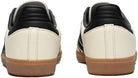Rear view of a pair of adidas Samba OG - Women sneakers, featuring leather uppers, black heel tabs, and brown rubber soles, placed side by side on a plain background.
