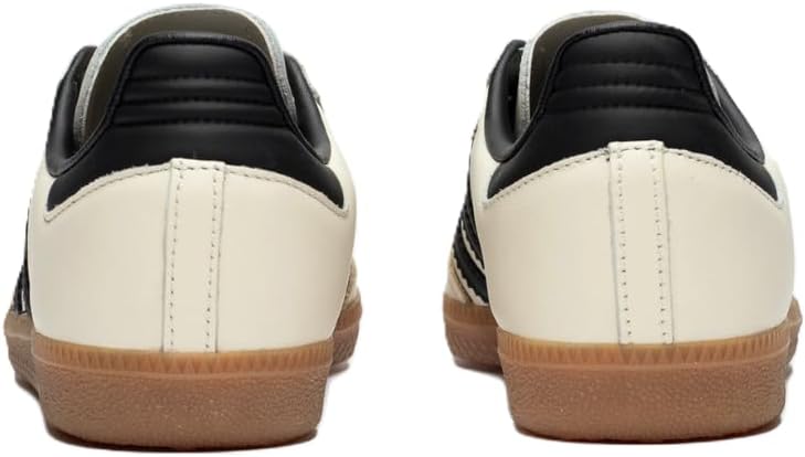 Rear view of a pair of adidas Samba OG - Women sneakers, featuring leather uppers, black heel tabs, and brown rubber soles, placed side by side on a plain background.