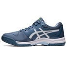 The ASICS Gel Dedicate 7 - Mens is a blue athletic tennis shoe with white accents and a white logo, offering stability through a cushioned sole and breathable mesh sections.